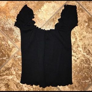 Off-shoulder ruffled shirt
